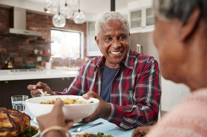 Picture of family enjoying dinner.