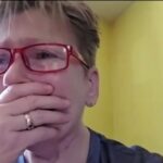 Picture of Mrs. Darlene Murphy being emotional when told she won the full mouth dental implant giveaway!