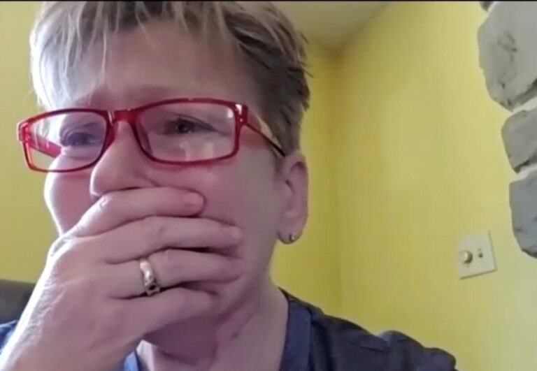 Picture of Mrs. Darlene Murphy being emotional when told she won the full mouth dental implant giveaway!